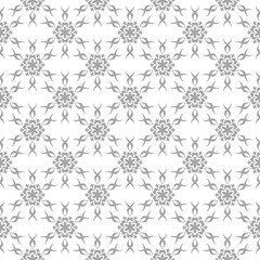 Gray floral ornamental design on white. Seamless backround