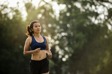 young asia woman jogging