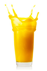 Fototapeta na wymiar Splash of orange juice in glass