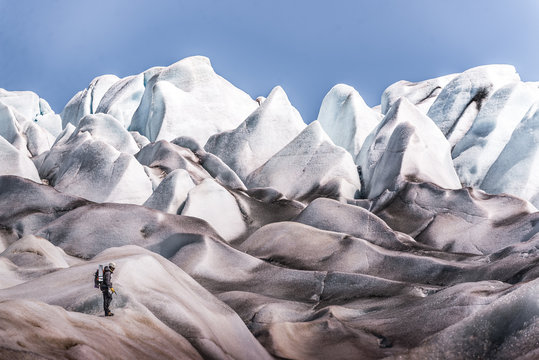 Man exploring Qualerallit glacier, Narsaq, Kitaa, Greenland