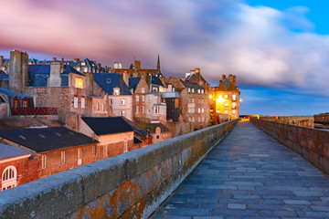 Night view of beautiful walled city Intra-Muros in Saint-Malo, also known as city corsaire,...