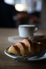 croissant on wood background