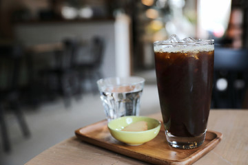 Iced black coffee on coffee shop