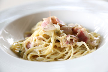Spaghetti carbonara white sauce with bacon and cheese