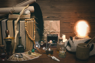 Crystal ball and tarot cards on fortune teller desk. Future reading concept. Paranormal magic table.