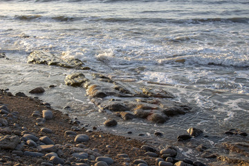 Waves crashing onto the beach