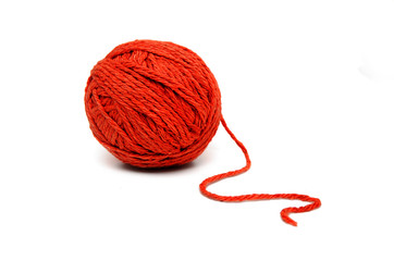 Ball of red yarn isolated on white
