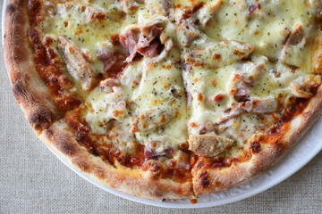 Pizza ham bacon with cheese and tomato sauce