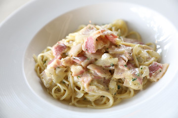 Spaghetti carbonara white sauce with bacon and cheese