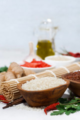 products for Japanese cuisine, rice, ginger and spices, vertical