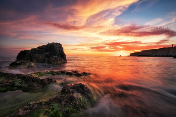 Obraz premium Beautiful summer landscape with sunset, colorful sky and sea. Composition of nature