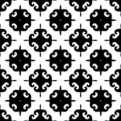 Seamless decorative pattern with spirals in a blavk and white colors