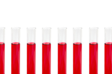 Row of test tubes with red liquid, isolated on white