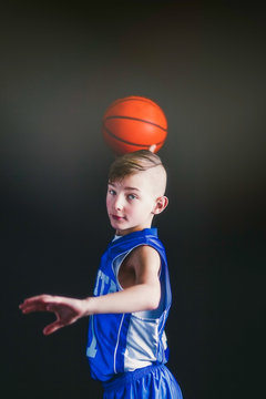 Boy about to throw basketball