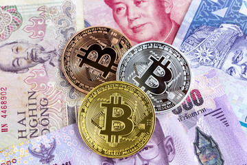 Bitcoin and banknote of Asia groups. Virtual money concept.