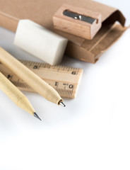 Stationery set,Set of wooden writing tools, pencil, pen, ruler, eraser and sharpener on white background