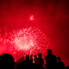 Crowd of people watching Canada Day fireworks celebration outside the Canadian Museum of History, Gatineau, Quebec, Canada