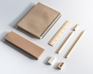 Stationery set,Set of wooden writing tools, pencil, pen, ruler, eraser and sharpener on white background