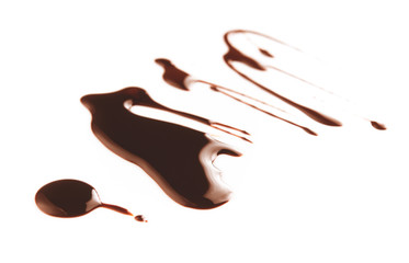 Chocolate syrup drip isolated on white