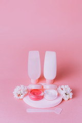 Cosmetic and lilac flowers