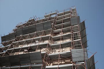 scaffolding with protection on the building