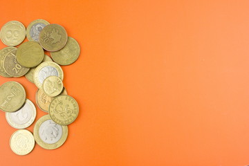 Worlds money coins. Orange texture. Empty space for your text