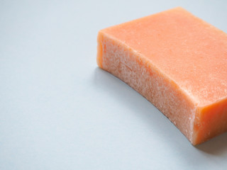 Soap economic on a wooden background. One piece handmade soap.