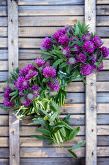 Fototapeta na wymiar tender bouquets on a wooden background