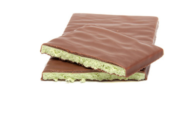 Milk chocolate with mint filling isolated on the white