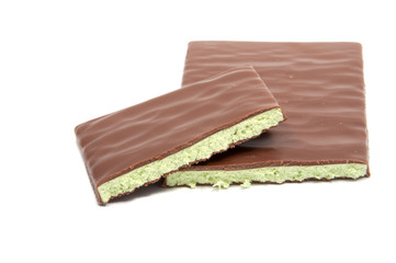 Milk chocolate with mint filling isolated on the white
