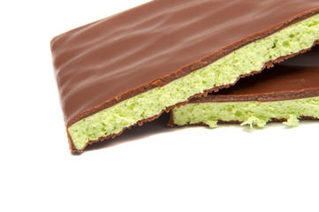 Milk chocolate with mint filling isolated on the white