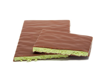 Milk chocolate with mint filling isolated on the white