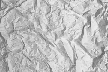 Crumpled white paper abstract background.