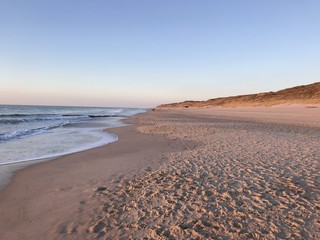 Fototapeta na wymiar Sunset at a beach