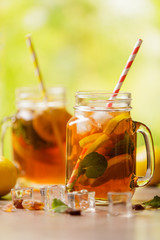Iced tea with lemon and ice cubes