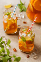Iced tea with lemon and ice cubes