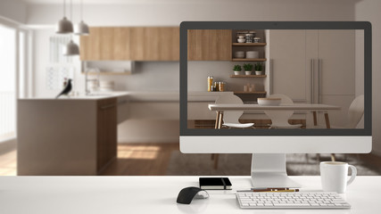 Architect house project concept, desktop computer on white work desk showing real finished minimalist white and wooden kitchen, minimalistic blurred interior design in the background