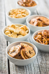 Mixed salty snack crackers and pretzels.