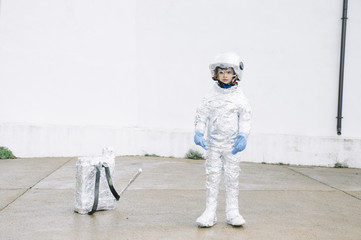 Little boy happy playing to become an astronaut