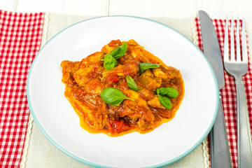 Fillet meat chicken, turkey with paprika and tomatoes