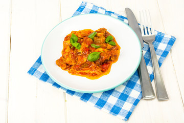 Fillet meat chicken, turkey with paprika and tomatoes