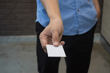 The young man took a blank card and handed it to him.