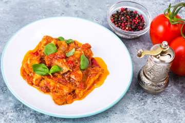 Fillet meat chicken, turkey with paprika and tomatoes