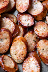 Macro close up on a pile of sliced sausage