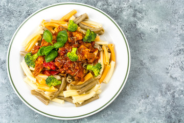 Pasta with chicken fillet, tomatoes, sweet pepper