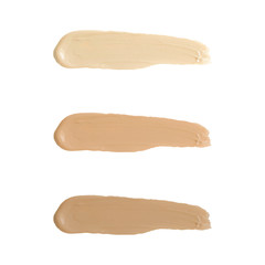 Fototapeta na wymiar Liquid foundation tone smudge. Set concealer smear cosmetic cream isolated on white background, brown stroke texture. Makeup Vector
