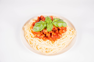 Spaghetti bolognese on a white background