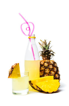 Pineapple juice and fresh fruit isolated