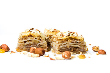 Baklava dessert with nuts and raisins isolated