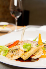 Meat dish with vegetables served in a restaurant